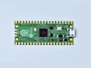 Raspberry Pi Pico 2 microcontroller board seen from above, with its micro-USB port