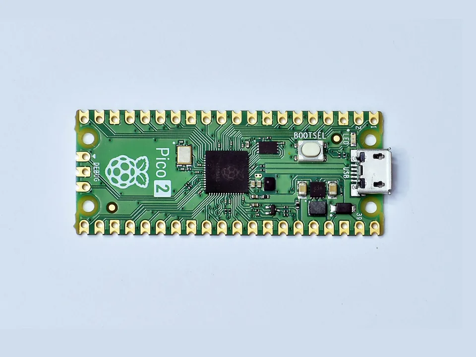 Raspberry Pi Pico 2 microcontroller board seen from above, with its micro-USB port